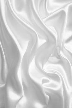 Smooth elegant white silk or satin can use as wedding background 