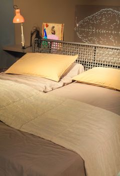 MILAN, ITALY - APRIL 16: View of bed displayed at Tortona space location of important events during Milan Design week on April 16, 2015