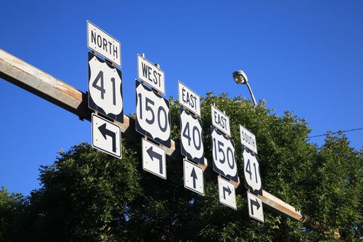 U.S. Highway signs in point in different directions.