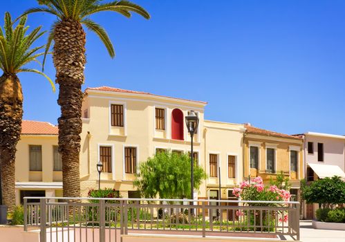 Buildings, trees and other plants in the Central square of the city of Rethymno, Crete, Greece.