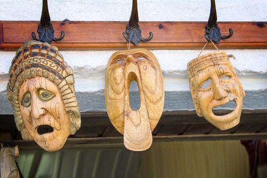 Original Souvenirs : theatrical masks, made of wood and symbolizing a variety of emotional States.