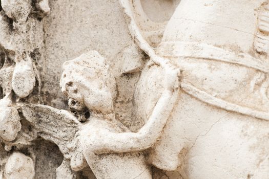 detail of a cherub marble