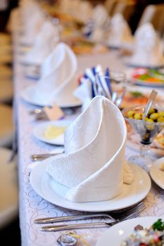 Ballroom decorated for wedding reception in restaurant