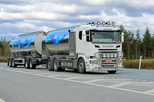 SALO, FINLAND - MAY 2, 2015: New Scania R500 tank truck transports Valio milk along motorway. The usual temperature of transported milk is 3 degrees Celsius.