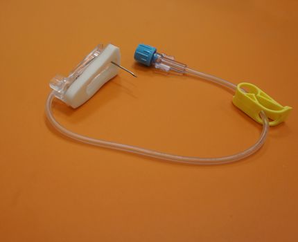 Port-A-cath needle, the needle tip is bent, has joint for connected to the tube.                  