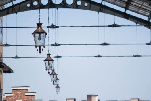 roof of railway station with old-fashioned lanterns