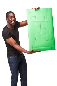 The smiling african man as black businessman with green panel, isolated on white background. Positive human emotions and advertising of something