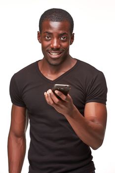 Portrait of smiling african man talking on the phone isolated on a white background