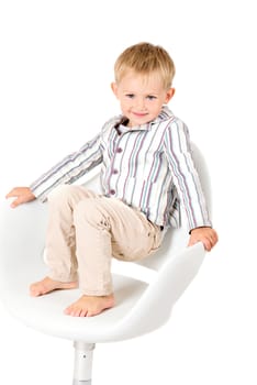 Boy in shirt shot in the studio on a white background