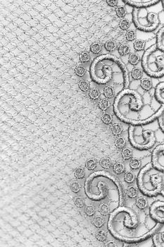 Decorative silver lace on insolated white background
