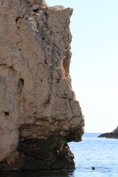Photo of a beautiful cliff in Croatia, Vis island - Stiniva