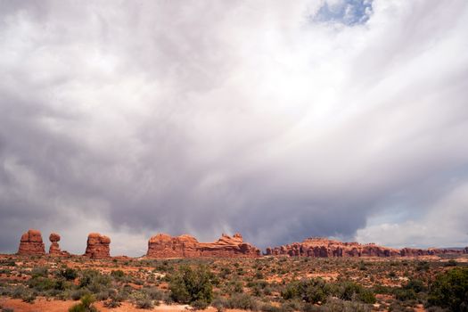 A horizontal compostion of rock buttes before it rains in the Utah Wilds