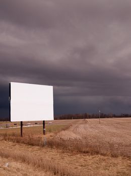 A thuderstorm passes as the billboard advertises nothing