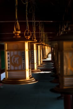 Golden lanterns in japanese temple