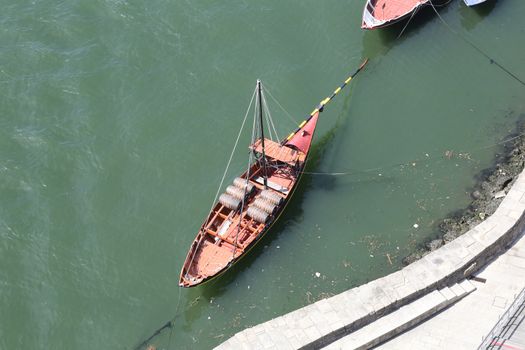 Vessels on the Duoro river in Porto, Portugal