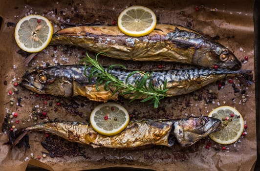 Baked Whole Fish with Spice, Lemon and Rosemary on a Roaster Pan with Baking Paper