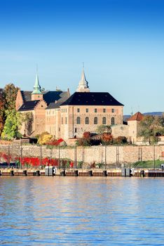 Akershus Fortress at sunset on autumn day, Oslo, Norway
