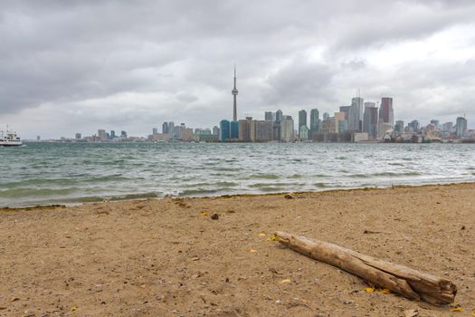 This photo was shot from snake island which is opposite to Toronto city. The leaves of trees change color.