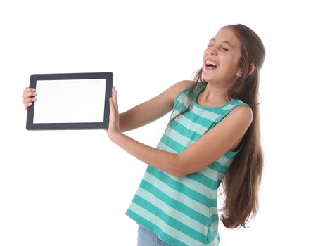 Beautiful pre-teen girl laughing with a tablet computer. Clipping path for the screen