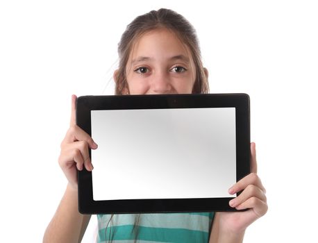 Beautiful pre-teen girl with a tablet computer. Isolated. Clipping path for the screen