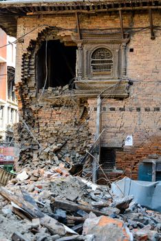 KATHMANDU, NEPAL - MAY 14, 2015: Damaged building and rubble after two major earthquakes hit Nepal in the past weeks.