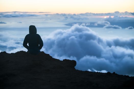 Watching sunset above Maui clouds from Haleakala