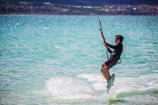 KAHULUI, HI /USA - AUGUST 30: California kite surfer Robert Blum practicing off Kanaha Beach on August 30, 2014 in Kahului, Maui, USA.