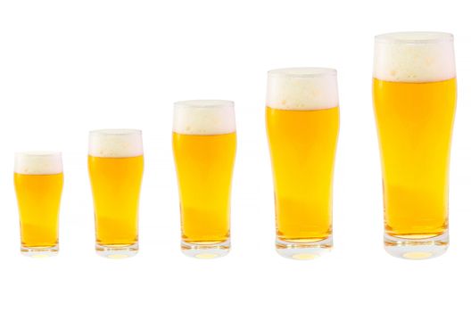 Five different sized glasses filled with cold beer.