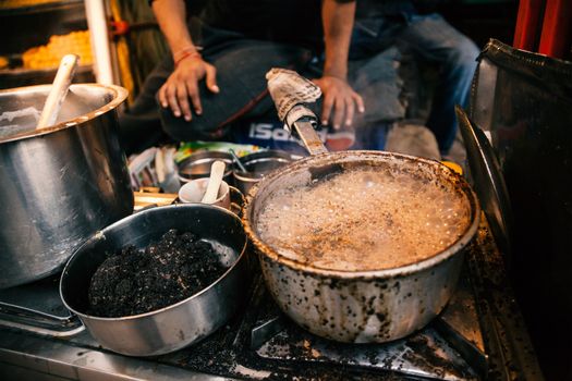 Indian tea being prepared in a vessel, CNB, Kanpur, India