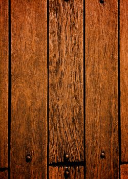 Background of Terracotta Old Wooden Deck Board with Nail Heads closeup