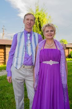 Successful and happy man and woman couple in smart clothes.