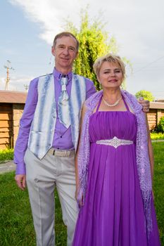 Successful and happy man and woman couple in smart clothes.