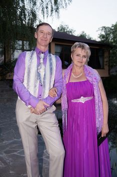 Successful and happy man and woman couple in smart clothes.