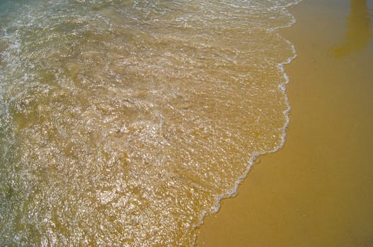 Sand beach and wave. For your commercial and editorial use.