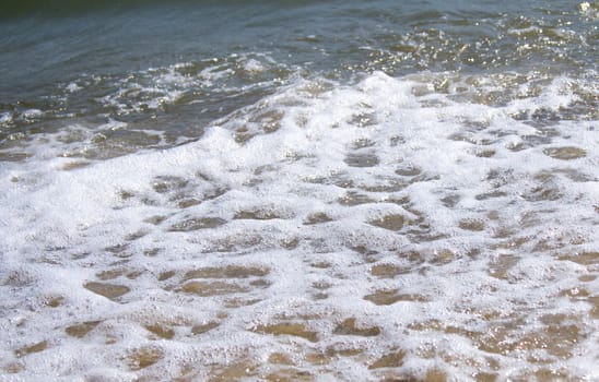 Sand beach and wave. For your commercial and editorial use.