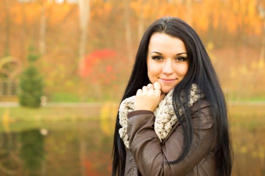 beautiful and sexy girl sitting on bench outdoors. 