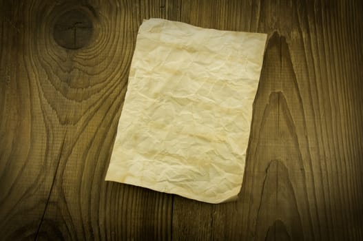 old paper on wood background. For your commercial and editorial use