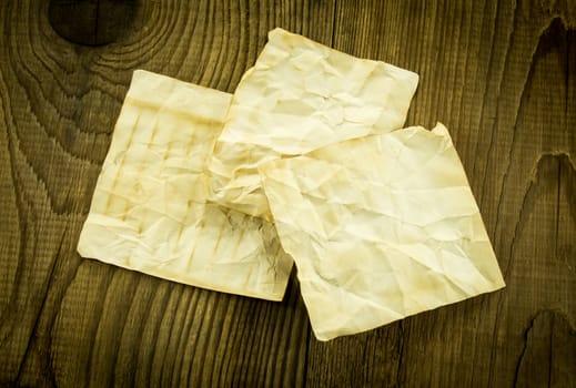 old paper on wood background. For your commercial and editorial use