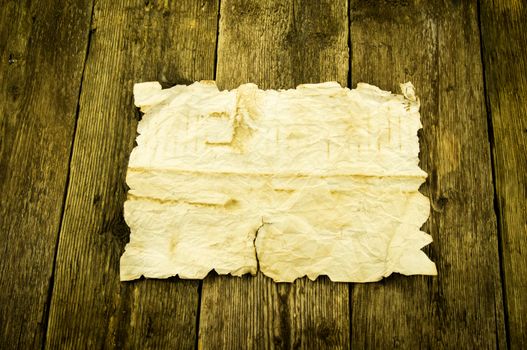 old paper on wood background. For your commercial and editorial use