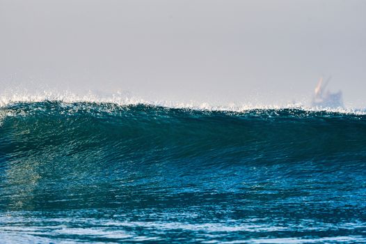 Tidal wave on the surface of the ocean