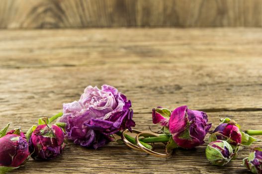 Red rose over wooden background. For your commercial and editorial use.