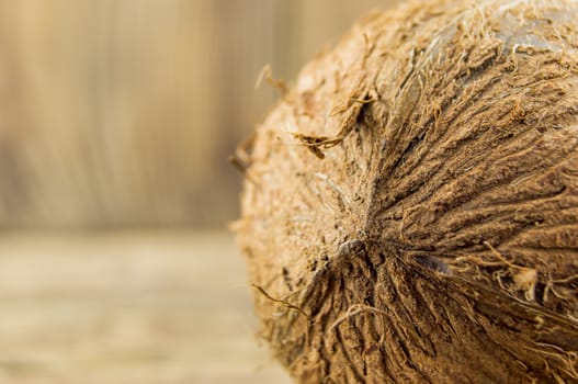 coconut and lie on a wooden background.