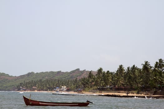 Old fishing boat at sea. India Goa.