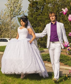 couple in love bride and groom together in wedding summer .