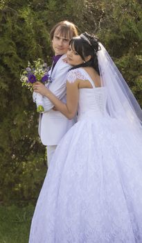 Happy young bride and groom on their wedding day. For your commercial and editorial use.