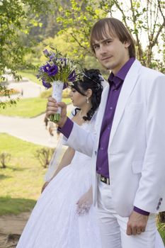 groom with a bouquet. For your commercial and editorial use.