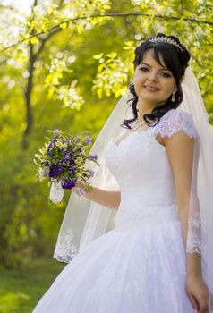 Beautiful bride posing in her wedding day. For your commercial and editorial use.