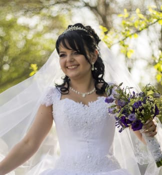 Beautiful bride posing in her wedding day. For your commercial and editorial use.