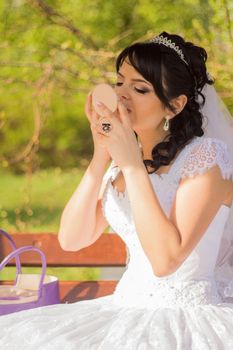 young bride is doing makeup. For your commercial and editorial use.