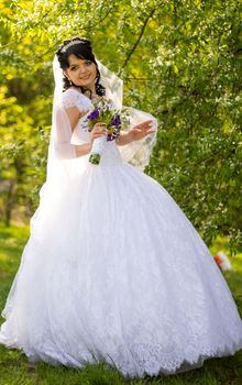 Beautiful bride posing in her wedding day. For your commercial and editorial use.